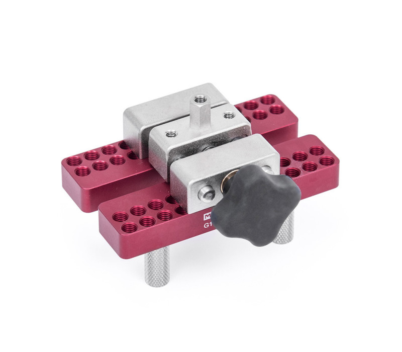 G1058 is a universal grip for pull testing and torque testing applications. Adjustable serrated metal posts accommodate a variety of sample shapes and sizes.