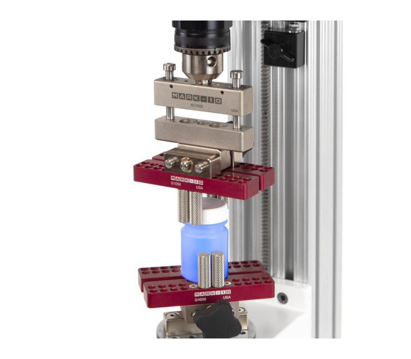 G1058 mounted to the torque loading plate by G1055 adapter and to the R50 above the test bottle with AC1029 Axial Compensator.