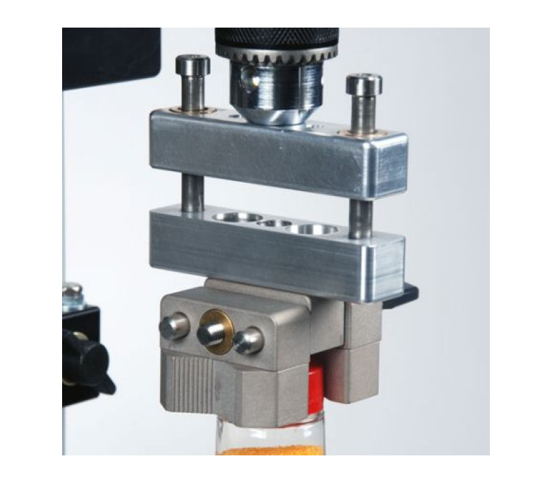 The AC1029 axial compensator, shown mounted between a Series R50 torque sensor and G1053 grip.