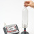 New MiniTest FH, MiniTest FH with standard probe FH 4 in stand for measuring the thickness of a glass bottle